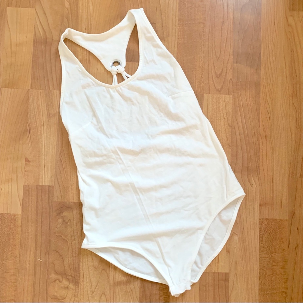 NWOT. White grommet back detail bodysuit